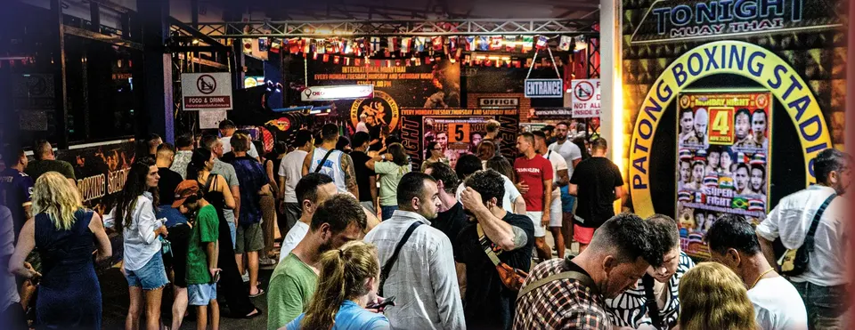 Guests gathering at the stadium entrance under the PATONG BOXING STADIUM sign